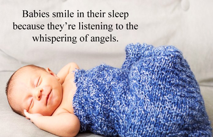 smiling-baby-in-sleeping